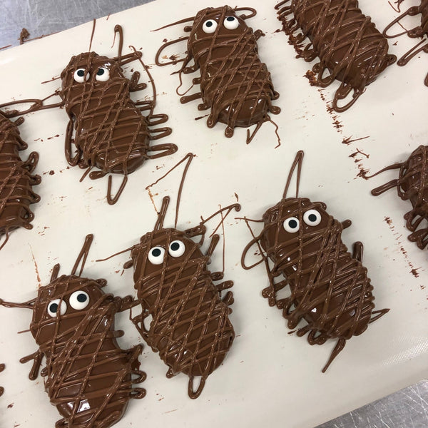Mummies (peanut butter cookies covered in milk or white chocolate) - Nandy's CandyMummies (peanut butter cookies covered in milk or white chocolate)