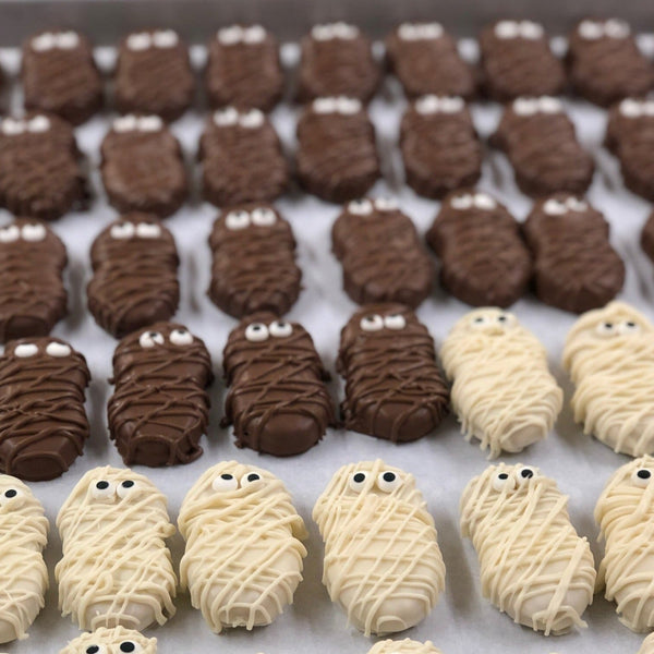 Mummies (peanut butter cookies covered in milk or white chocolate) - Nandy's CandyMummies (peanut butter cookies covered in milk or white chocolate)